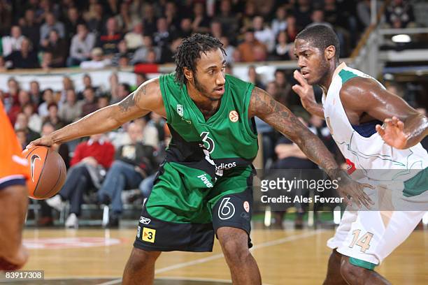 Xxx in action Bracey Wright, #6 of DKV Joventut competes with Frank Robinson, #25 of Union Olimpija during the Euroleague Basketball Game 6 match...