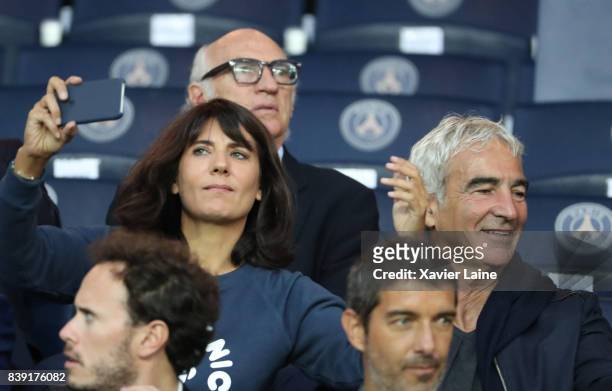 Estelle Denis take a selfie with his husband Raymond Domenech before the French Ligue 1 match between Paris Saint Germain and AS Saint-Etienne at...