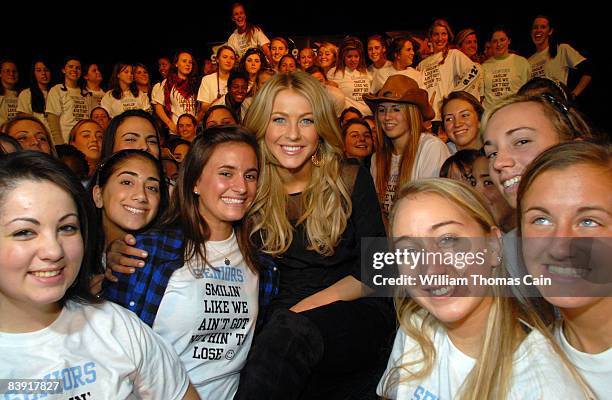 Singer and dancer Julianne Hough , formerly of "Dancing With The Stars" poses with some students at Merion Mercy Academy December 4, 2008 in Lower...