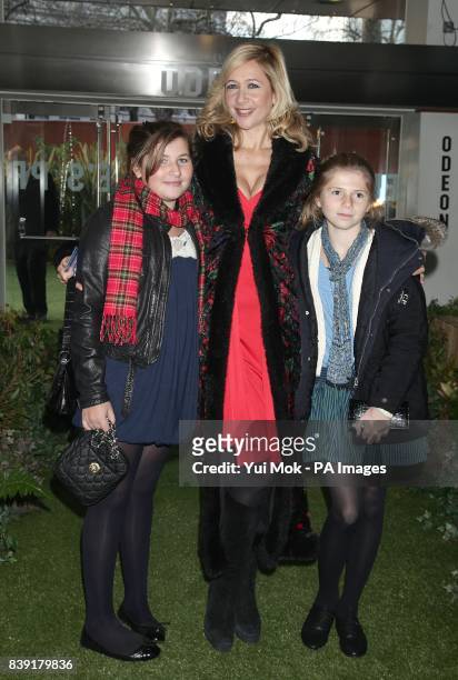 Tania Bryer and her children arriving for the premiere of Gnomeo and Juliet at the Odeon Leicester Square, London.