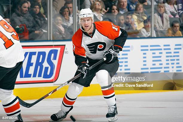 Jeff Carter of the Philadelphia Flyers skates for the puck during the game against the Toronto Maple Leafs at the Air Canada Centre November 29, 2008...