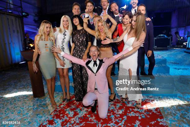 Winner 2017, Jens Hilbert, celebrates with participants during the finals of 'Promi Big Brother 2017' at MMC Studio on August 25, 2017 in Cologne,...