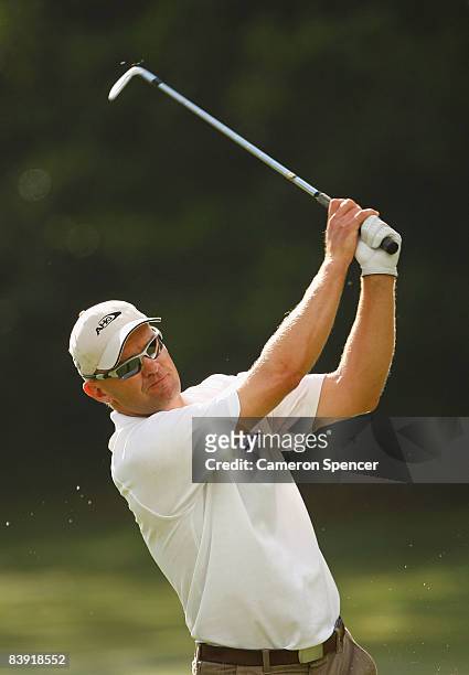 Michael Long of New Zealand plays a shot during day two of the Australian PGA Championship at the Hyatt Regency Resort on December 5, 2008 at Coolum...