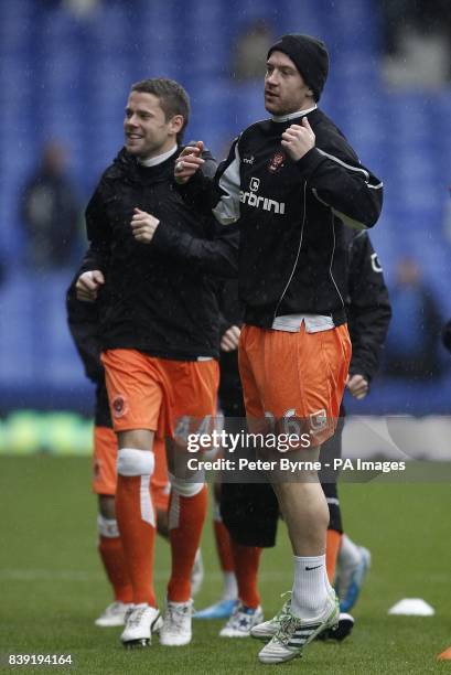 Blackpool's James Beattie and his team-mate Charlie Adam during the pre-match warm-up