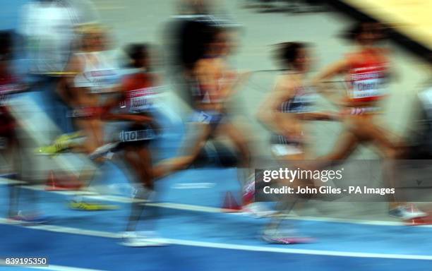 Great Britain's Helen Clitheroe is a narrow winner of the 3000metres Womens Event during day three of the European Indoor Athletics at the Palais...