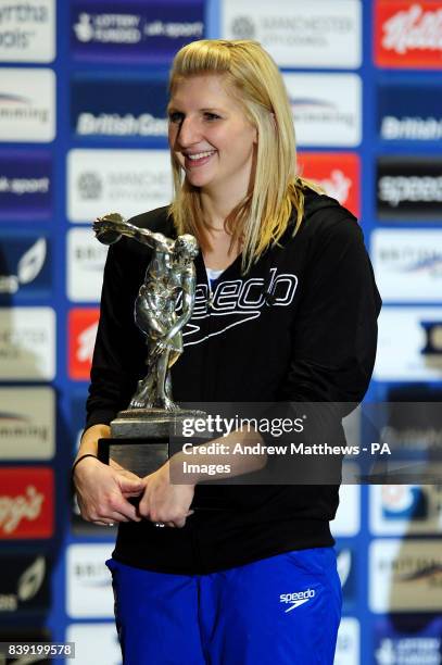 Rebecca Adlington is presented with the British Olympic Association's Athlete of the year trophy during the British Gas Swimming Championships at the...