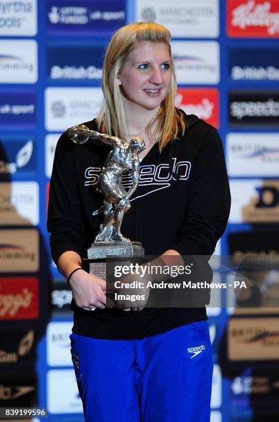 Rebecca Adlington is presented with the British Olympic Association's Athlete of the year trophy during the British Gas Swimming Championships at the...