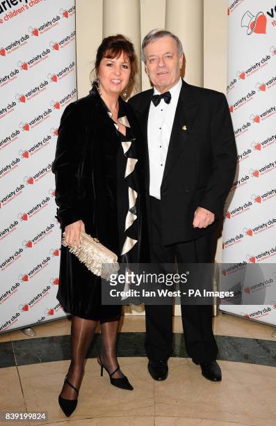 Tony Blackburn and his wife Debbie arrive at the Variety Club Annual Dinner at the Grosvenor House Hotel in London.