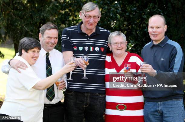 Lottery winners, from left, Christine Mowat, Andrew Mowat, John Bell, Chris Bell and Joe Burton celebrate sharing just over 4 million pounds in the...