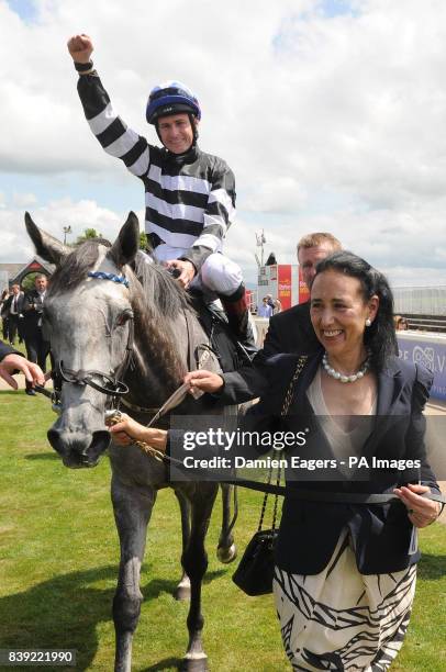 Owner, Lady O'Reilly leads Chinese White and jockey Pat Smullen in after winning the Audi Pretty Polly Stakes on Audi Pretty Polly Stakes day at...