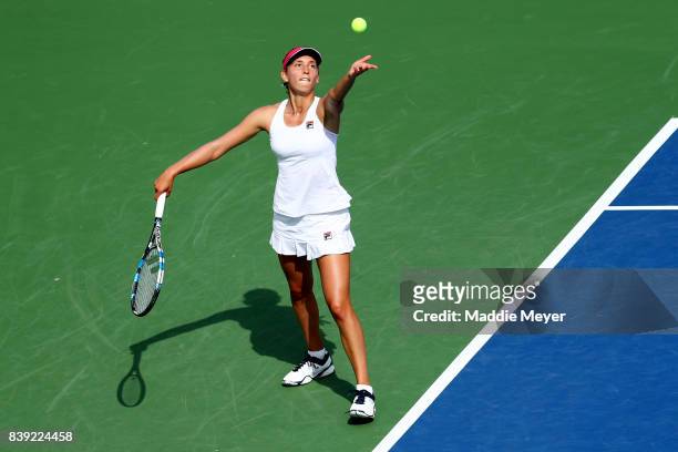 Elise Mertens of Belgium serves to Dominika Cibulkova of Slovakia during Day 7 of the Connecticut Open at Connecticut Tennis Center at Yale on August...