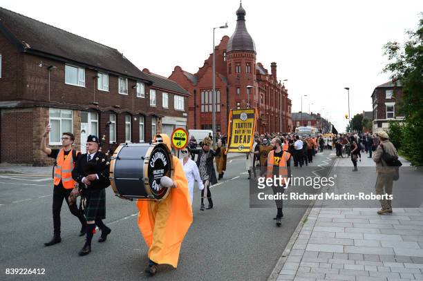Marchers on The Great Pull North embark fom the Florrie on the Toxteth Day of the Dead as The Justified Ancients of Mu Mu Present 'Welcome To The...
