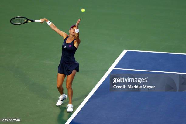 Agnieszka Radwanska of Poland serves to Daria Gavrilova of Australia during Day 7 of the Connecticut Open at Connecticut Tennis Center at Yale on...