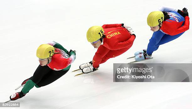 Erika Huszar of Hungary, Zhou Yang of China and Liya Stepanova of Russia compete in the Ladies 1500m heat during the Samsung ISU World Cup Short...
