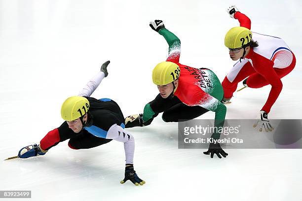 Thibaut Fauconnet of France, Peter Darazs of Hungary and Bartosz Konopko of Poland compete in the Men's 500m heat during the Samsung ISU World Cup...