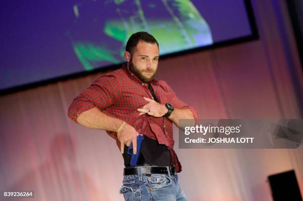 Model walks the runway during the NRA Concealed Carry Fashion Show on Friday, August 25, 2017 in Milwaukee, Wisconsin.