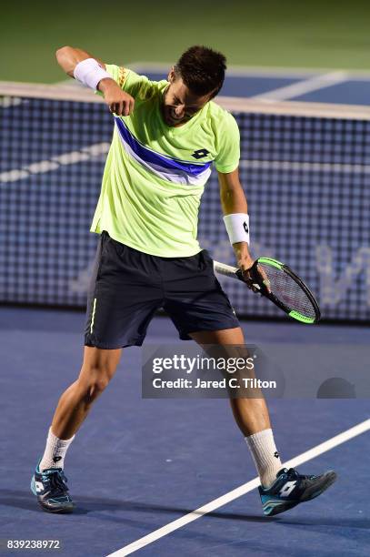 Damir Dzumhur of Bosnia and Herzegovina reacts after defeating Kyle Edmund of Great Britain in their semifinals match in the Winston-Salem Open at...