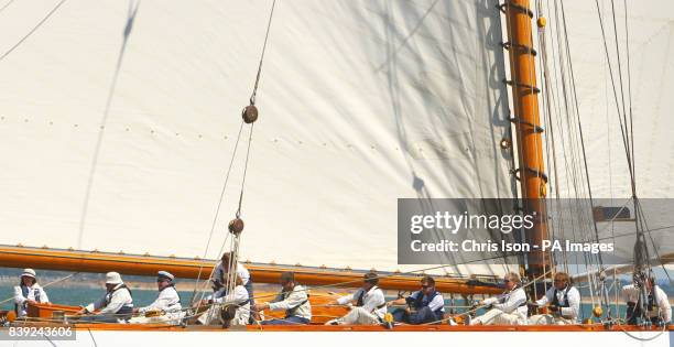 The crew of the 1923 William Fife 19 metre Mariquita haul in the headsail as they gybe the boat on the third day of the British Classic Yacht Club...