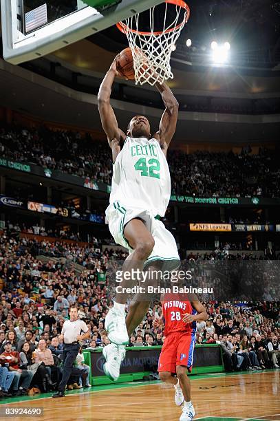 Tony Allen of the Boston Celtics goes to the basket over Arron Afflalo of the Detroit Pistons during the game on November 20, 2008 at TD Banknorth...