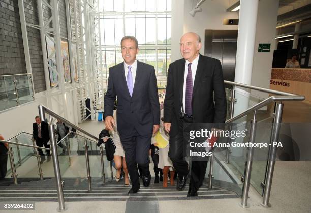 Businessman and Dragon's Den star Peter Jones and Business Secretary Vince Cable arrive for the launch of the National Enterprise Academy within...
