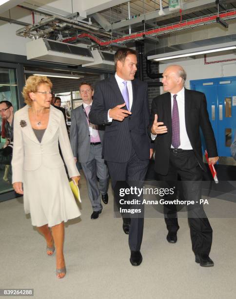 Businessman and Dragon's Den star Peter Jones and Business Secretary Vince Cable arrive for the launch of the National Enterprise Academy within...