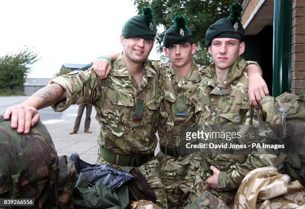 Rangers Luke Herbert, Peter Jones and Kris Hanlon from the 1st Battalion, Royal Irish Regiment prepare to leave for Afghanistan from their barrack at...