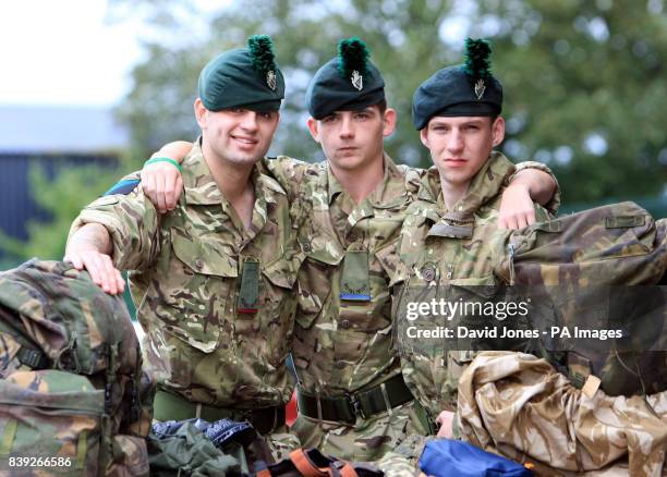 Rangers Luke Herbert, Peter Jones and Kris Hanlon from the 1st Battalion, Royal Irish Regiment prepare to leave for Afghanistan from their barrack at...