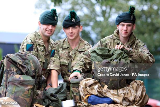 Rangers Luke Herbert, Peter Jones and Kris Hanlon from the 1st Battalion, Royal Irish Regiment prepare to leave for Afghanistan from their barrack at...