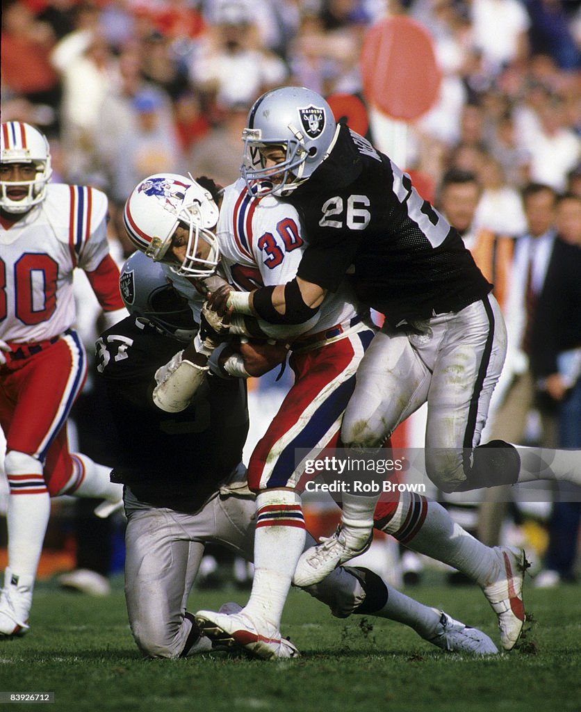 1985 Patriots Roster New England Patriots running back Mosi Tatupu carries the football ...