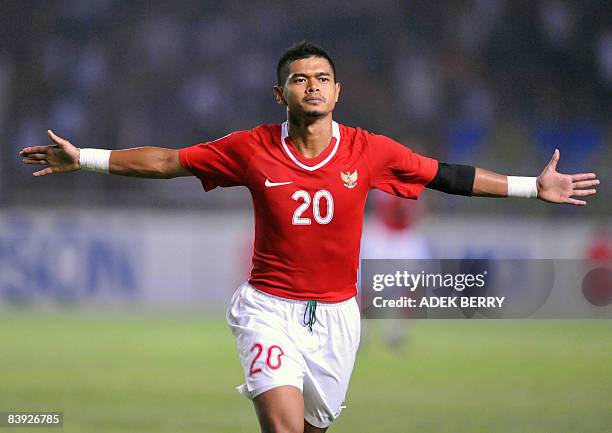 Indonesia's Bambang Pamungkas celebrates his team's third goal against Myanmar during the AFF Suzuki Cup football match in Jakarta on December 5,...