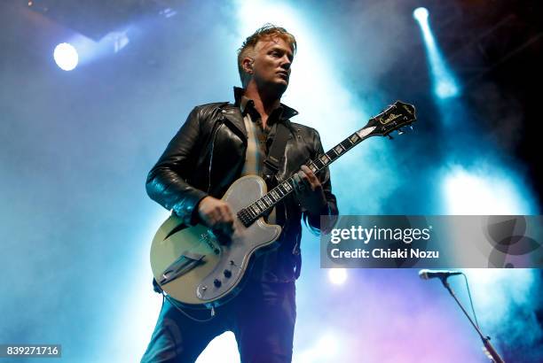 Josh Homme of Queens of the Stone Age performs at Reading Festival at Richfield Avenue on August 25, 2017 in Reading, England.