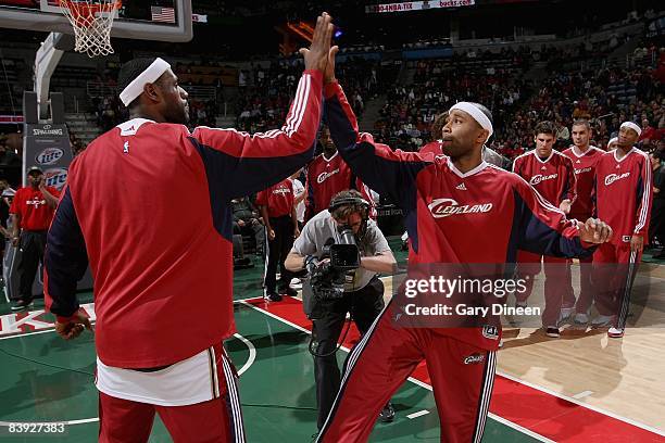 LeBron James and Mo Williams of the Cleveland Cavaliers celebrate before the game against the Milwaukee Bucks on November 29, 2008 at the Bradley...