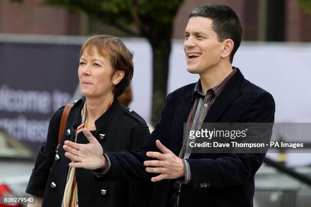 David Miliband arrives with his wife Louise Shackelton at the Manchester Conference Centre, Manchester, before the announcement of the new Labour...