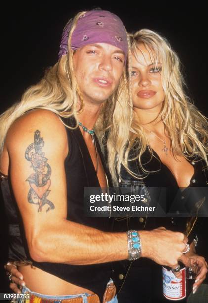 Pamela Anderson and Bret Michaels of the band Poison attend a party at New York's Webster Hall, 1994.
