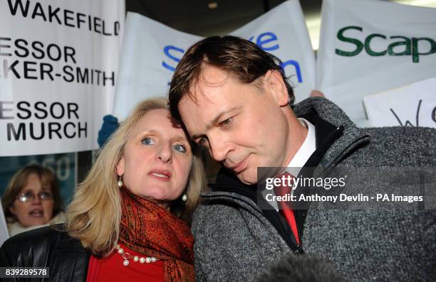 Research doctor Andrew Wakefield with wife Carmen Wakefield as he makes a statement at the General Medical Council headquarters in London.