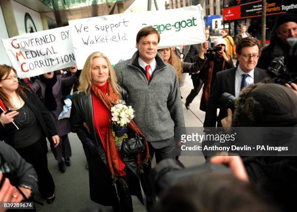 Research doctor Andrew Wakefield arrives with wife Carmen Wakefield to make a statement at the General Medical Council headquarters in London.