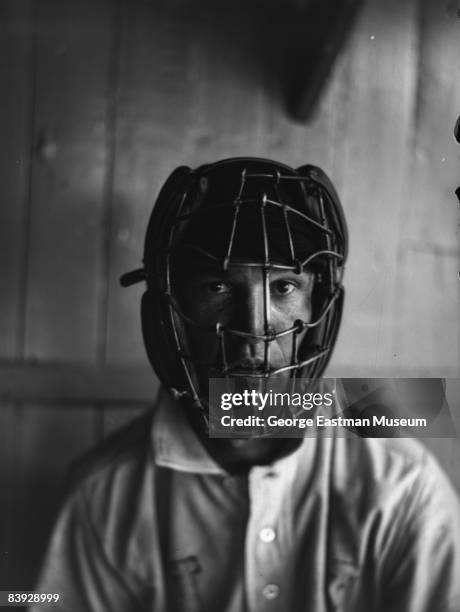 Portrait of a professional baseball player wearing a catcher's mask, possibly pitcher Vic Willis , ca.1900s.