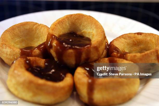 Plate full of Yorkshire puddings, whose makers could win the same special protection afforded to Champagne and Parma ham producers to stop rivals...
