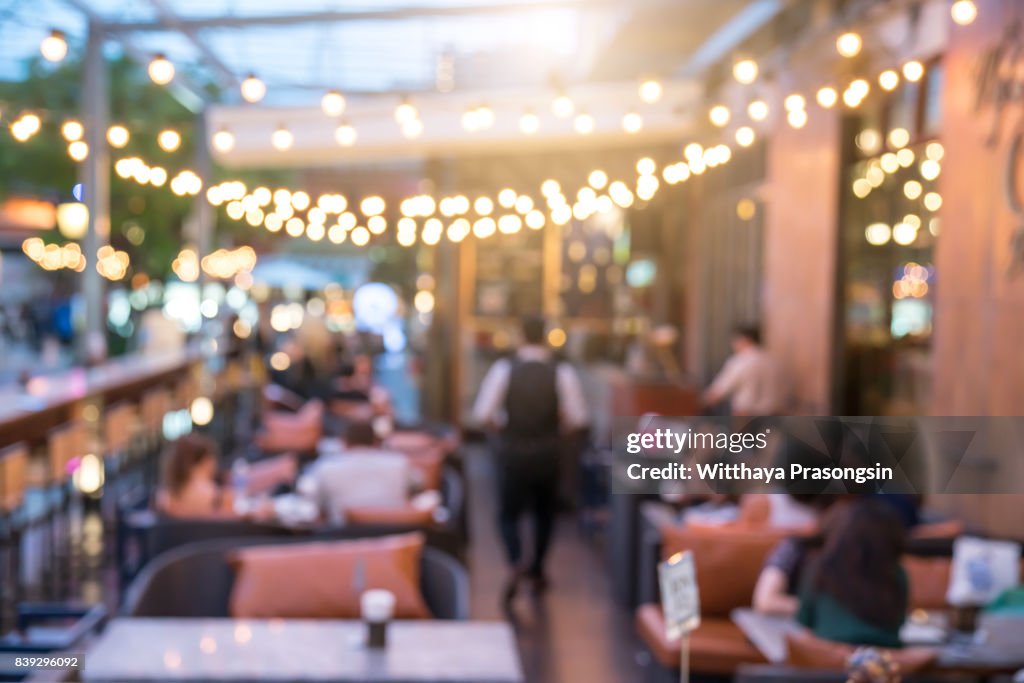 People sit in a blur banquets.