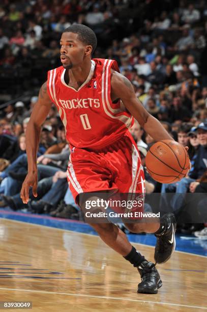 Aaron Brooks of the Houston Rockets moves the ball up court during the game against the Denver Nuggets at Pepsi Center on November 30, 2008 in...