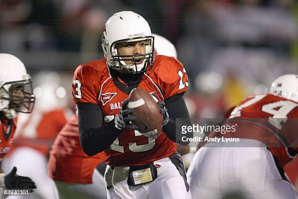 Quarterback Nate Davis of the Ball State Cardinals drops back with the ball during the MAC game against the Western Michigan Broncos at Scheumann...