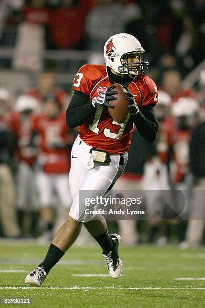 Quarterback Nate Davis of the Ball State Cardinals drops back to pass the ball during the MAC game against the Western Michigan Broncos at Scheumann...