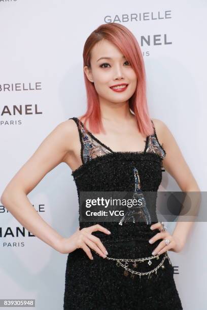 Singer Joey Yung attends the Gabrielle Chanel perfume party on August 25, 2017 in Hong Kong, China.