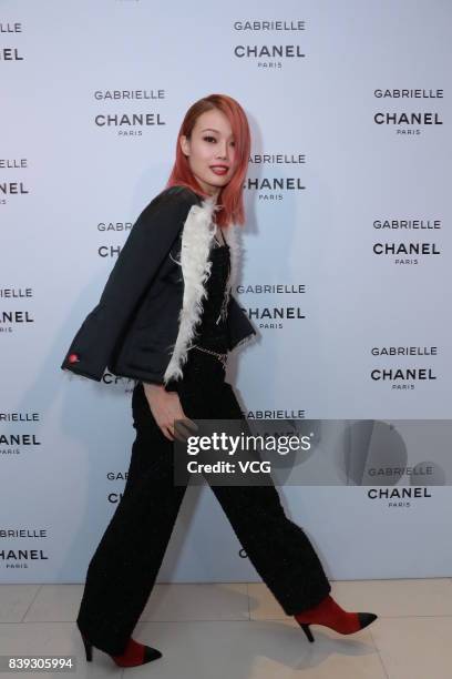 Singer Joey Yung attends the Gabrielle Chanel perfume party on August 25, 2017 in Hong Kong, China.