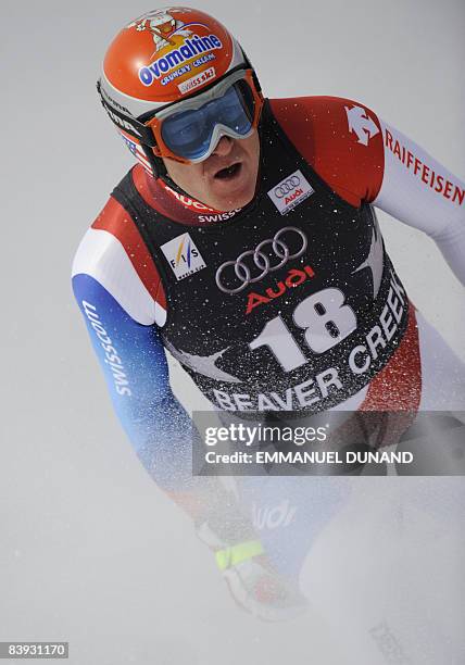 Swiss skier Didier Cuche reacts after crossing the finish line to place fifteenth in the FIS World Cup Men's Downhill race, in Beaver Creek,...