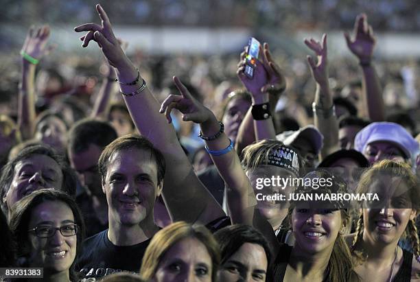 Fans of US singer Madonna wait for the beginning of her concert "Sticky & Sweet Tour" supporting her latest album, "Hard Candy" at Monumental stadium...