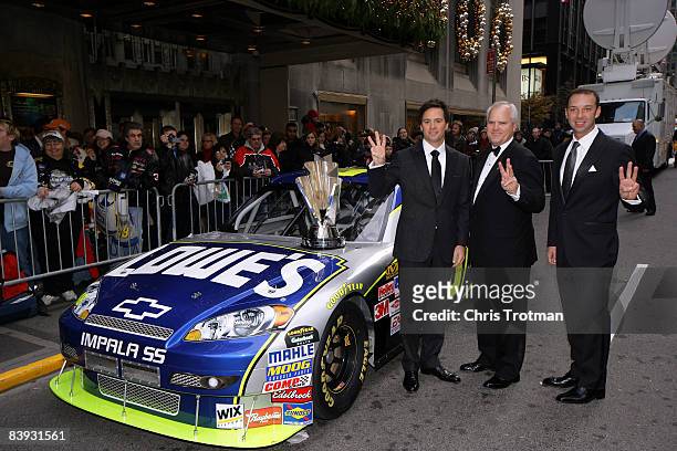 Jimmie Johnson, 2008 NASCAR Sprint Cup Champion, poses with Robert Niblock, CEO of Lowe's, and Crew Chief Chad Knaus prior to the NASCAR Sprint Cup...