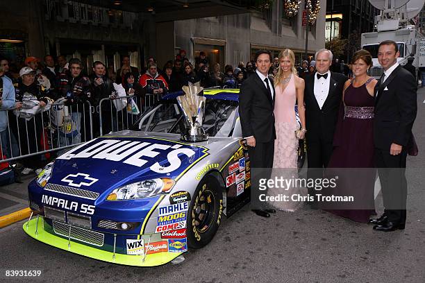 Jimmie Johnson, 2008 NASCAR Sprint Cup Champion, poses with his wife Chandra, Robert Niblock, CEO of Lowe's and his wife Melanie along wife Crew...