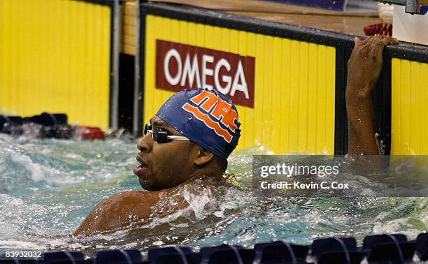 Cullen Jones watches after swimming in the final of the Mens 200 Yard Medley Relay in the 2008 Short Course National Championships at the Georgia...