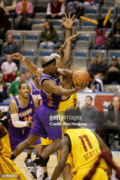 Curtis Stinson of the Iowa Energy scores over several Fort Wayne Mad Ants at Allen County Memorial Coliseum on December 5, 2008 in Fort Wayne,...
